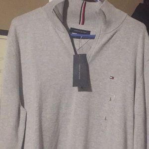 Heather grey quarter zip sweater.